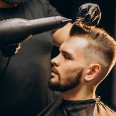 handsome-man-at-a-barber-shop-styling-hair_Easy-Resize.com