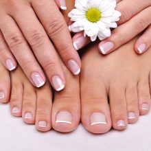 skincare-beauty-female-feet-with-camomile-s-flower_Easy-Resize.com